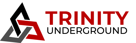 Logo of Trinity featuring red and black text with a geometric design of interlocking shapes on the left, embodying professional plumbing services.